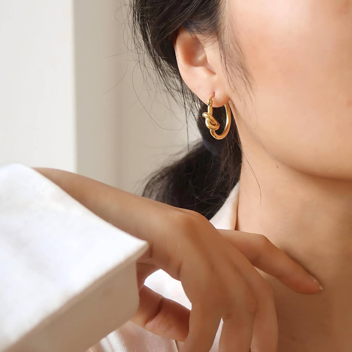 18K gold plated knot earrings side view Kuwait Jewelique